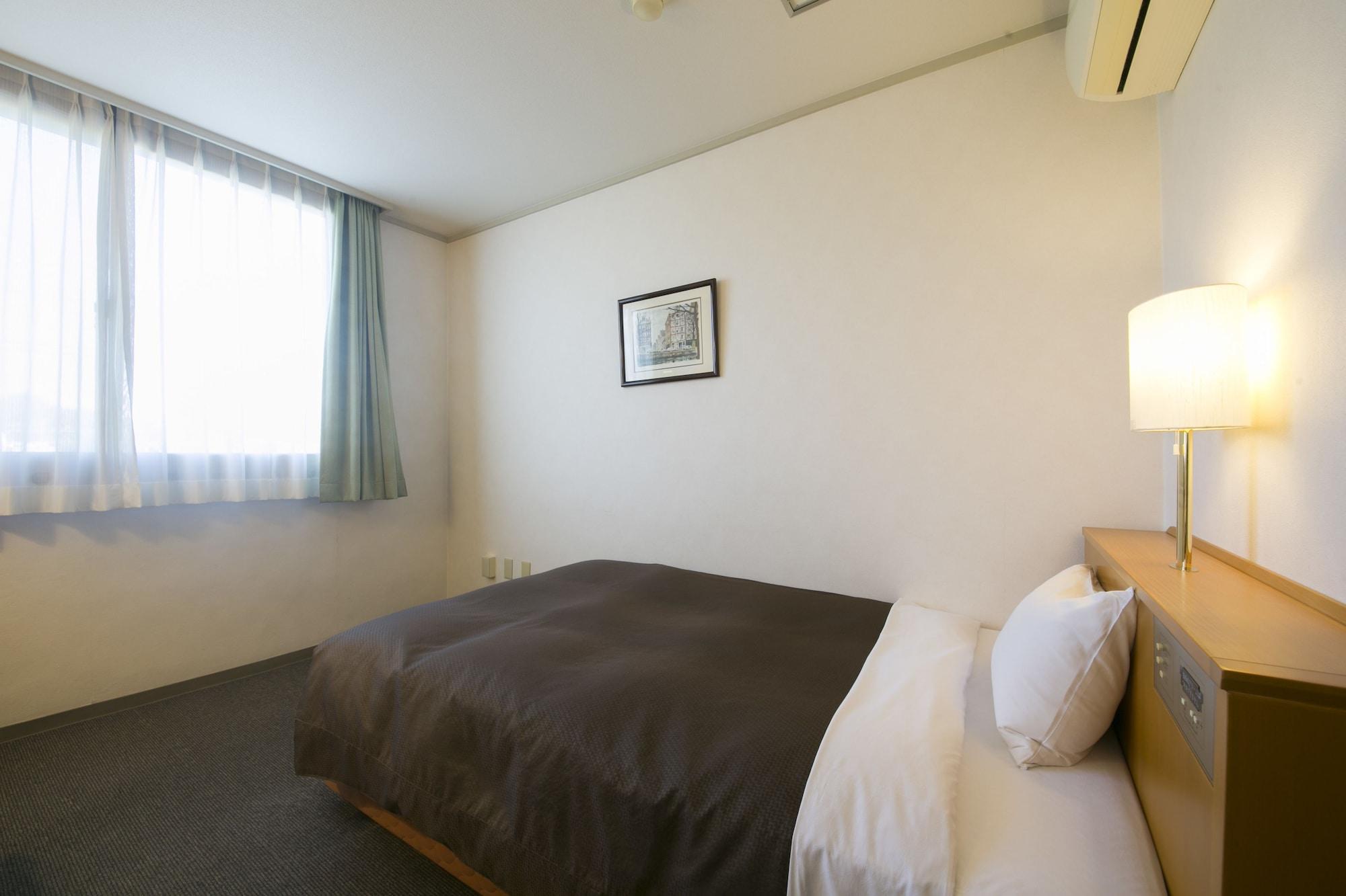 Business Hotel Kosanagi Tojota Kültér fotó