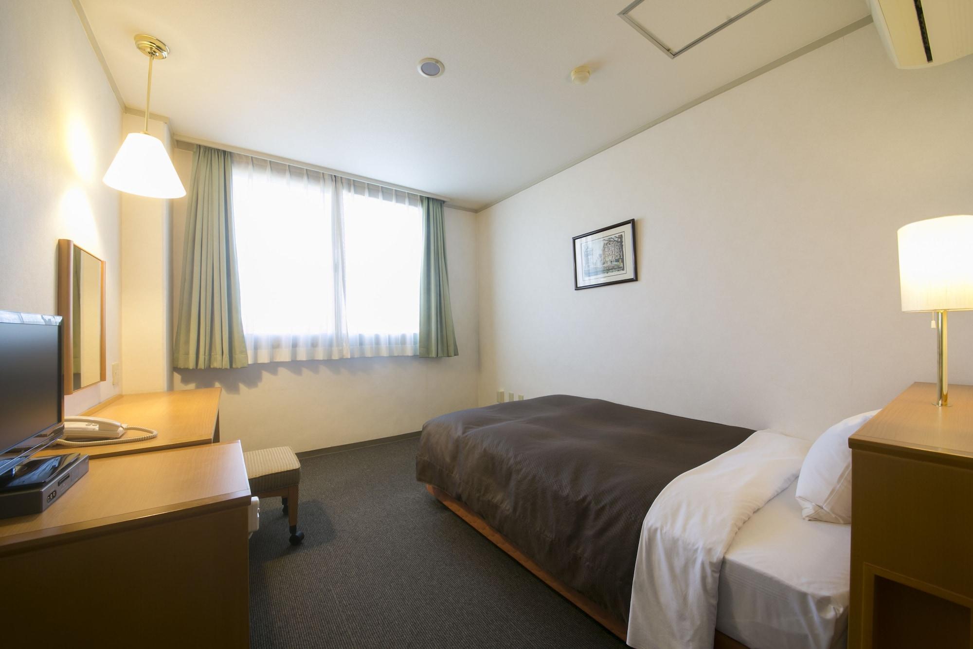 Business Hotel Kosanagi Tojota Kültér fotó